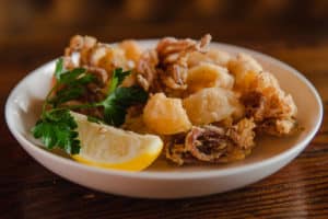 A plate of crispy calamari at Elia Authentic Greek Taverna.