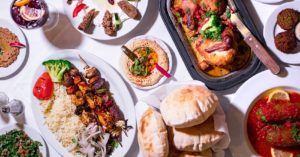 Plates of Greek food including pitta at Khoury's Mediterranean Restaurant.