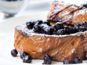 French toast topped with blueberries at Mon Ami Gabi. 