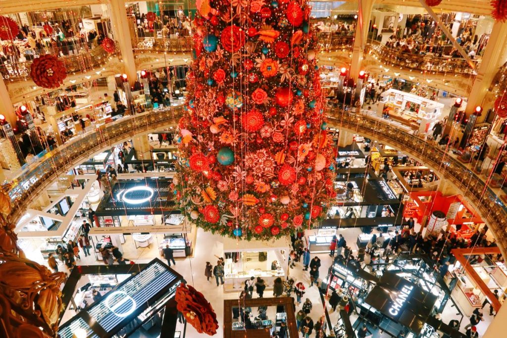 Inside a shopping center at Christmas time.